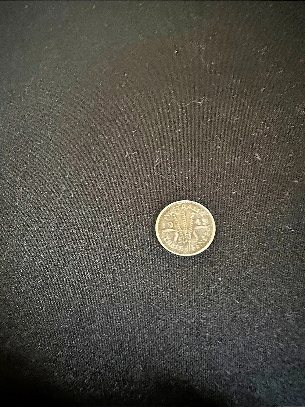 Foreign silver three pence coin